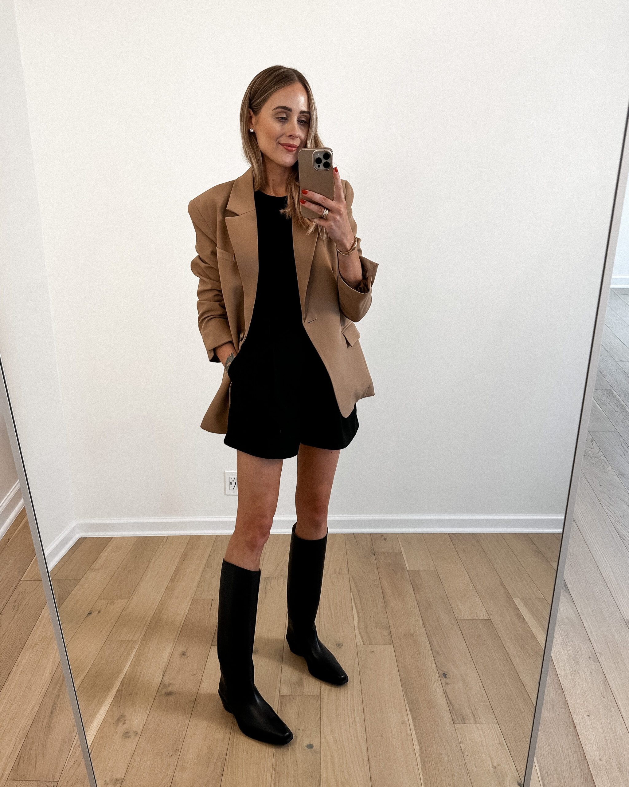 Fashion Jackson Wearing MAYSON the label Camel Boyfriend Blazer, Black Tank, Black Trouser Shorts, Black Knee High Boots, Business Casual Workwear Outfit