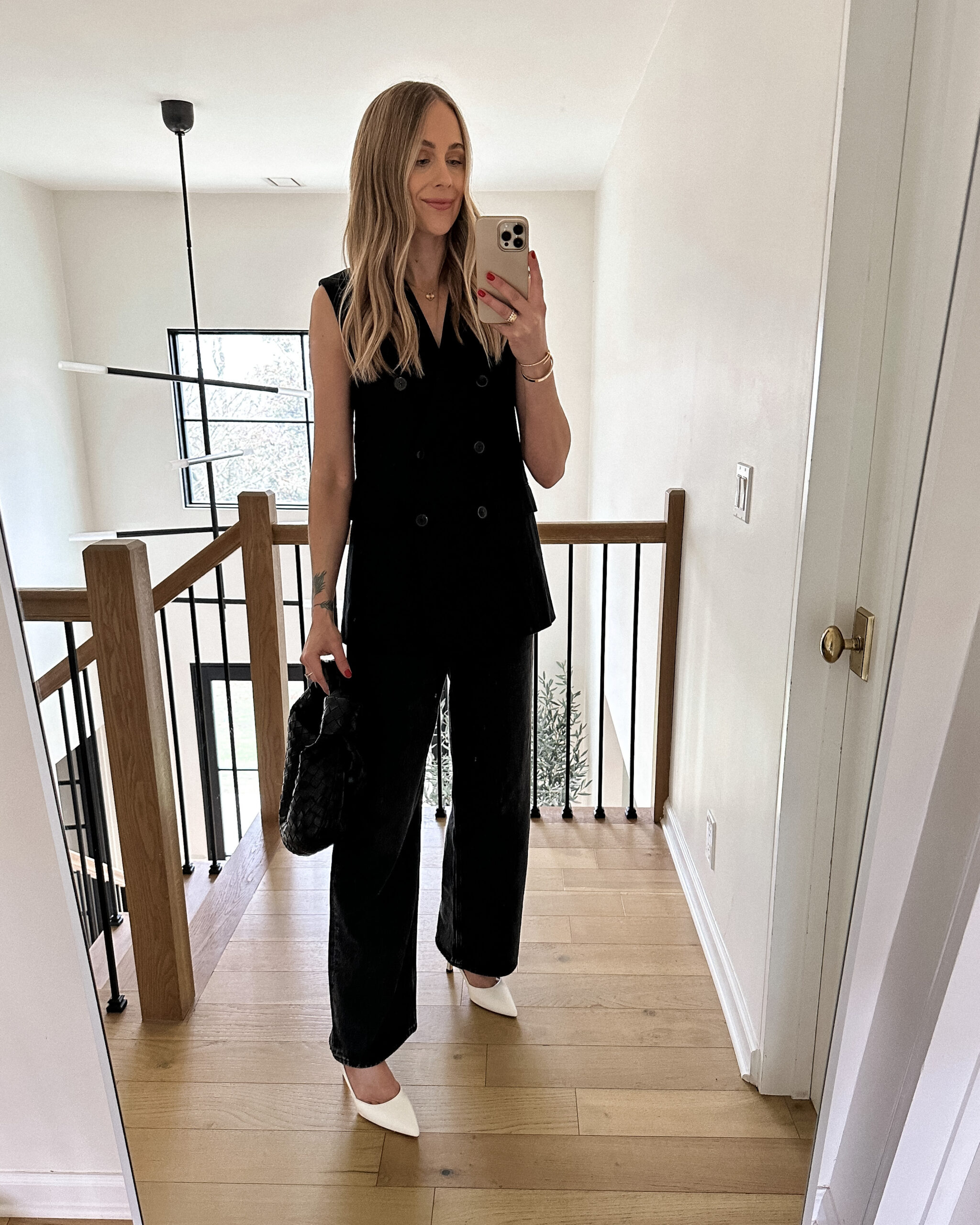 Fashion Jackson Wearing Black Sleeveless Blazer AGOLDE Black Slouchy Jeans White Slingback Pumps Bottega Veneta Teen Jodie Black Handbag Spring Capsule Wardrobe