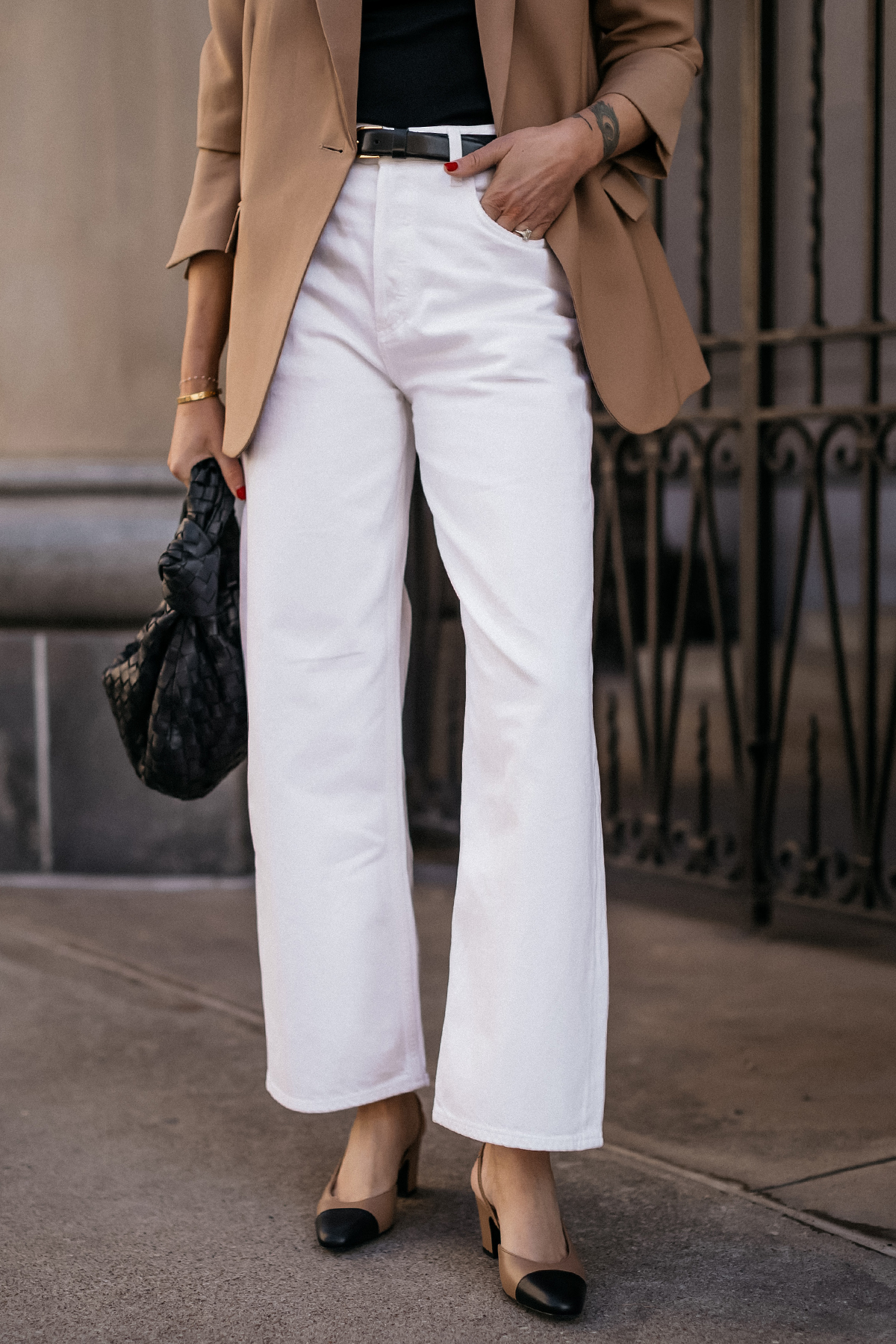 Fashion Jackson Wearing MAYSON the label Camel Boyfriend Blazer Black Tee AGOLDE White Jeans Black Belt Chanel Tan Slingbacks Bottega Veneta Black Teen Jodie Handbag