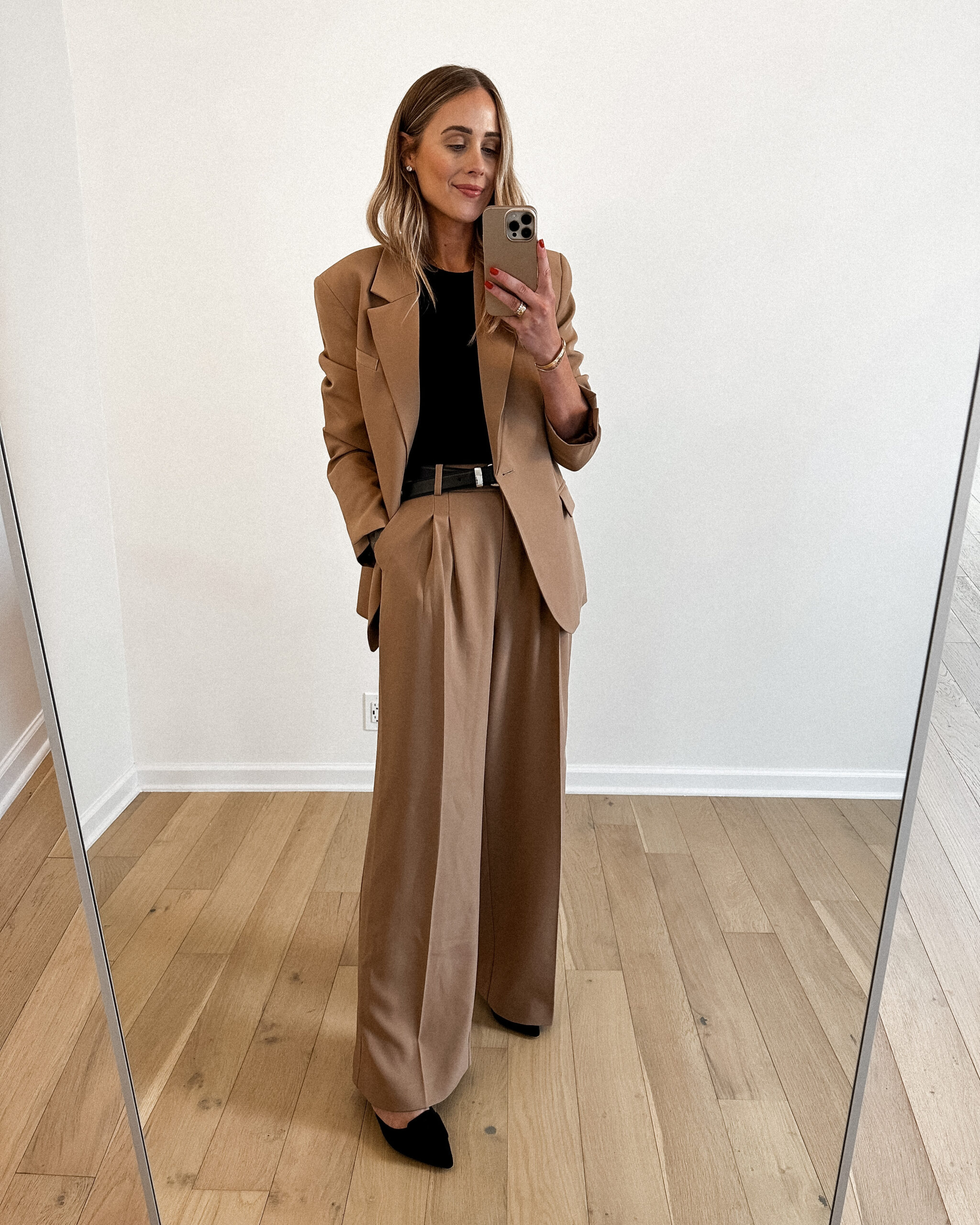 Fashion Jackson Wearing MAYSON the label Camel boyfriend blazer, black tank, camel wide leg trousers, black mules, khaite black benny belt, workwear outfit