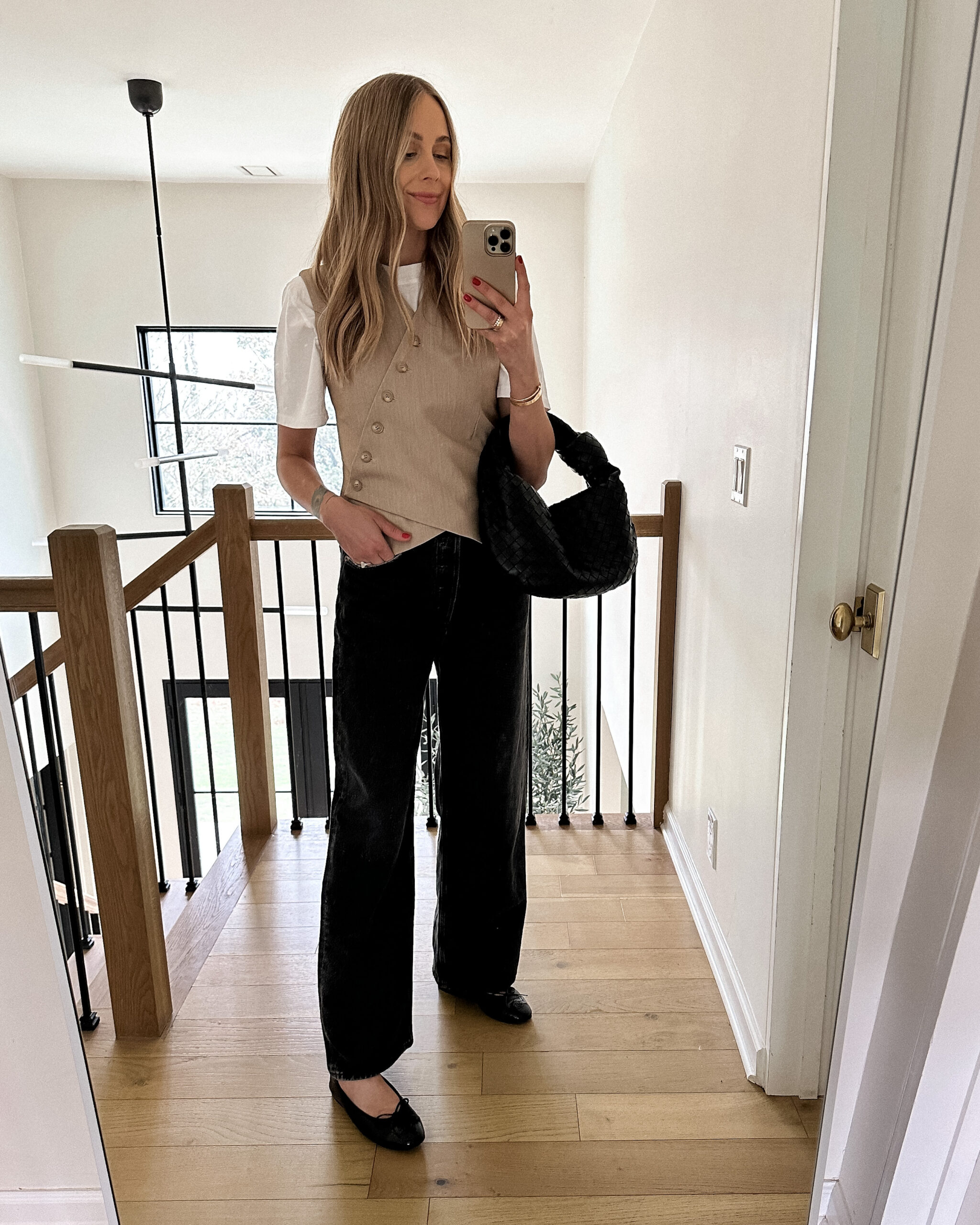 Fashion Jackson Wearing Frankie Shop Maesa Vest White Tshirt AGOLDE Slouchy Black Jeans Chanel Ballet Flats Bottega Veneta Black Teen Jodie Handbag Spring Capsule Wardrobe