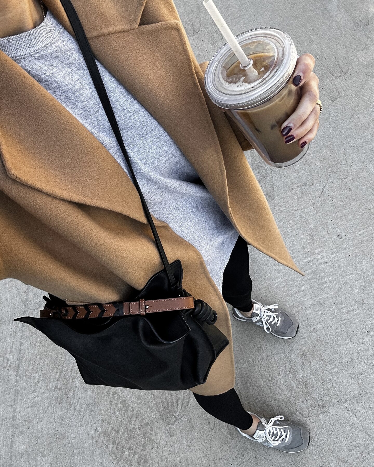 Fashion Jackson Wearing MAYSON the label camel wrap coat, grey sweatshirt, lululemon black leggings, new balanze 547 sneakers, loewe flamenco black handbag, casual fall outfit