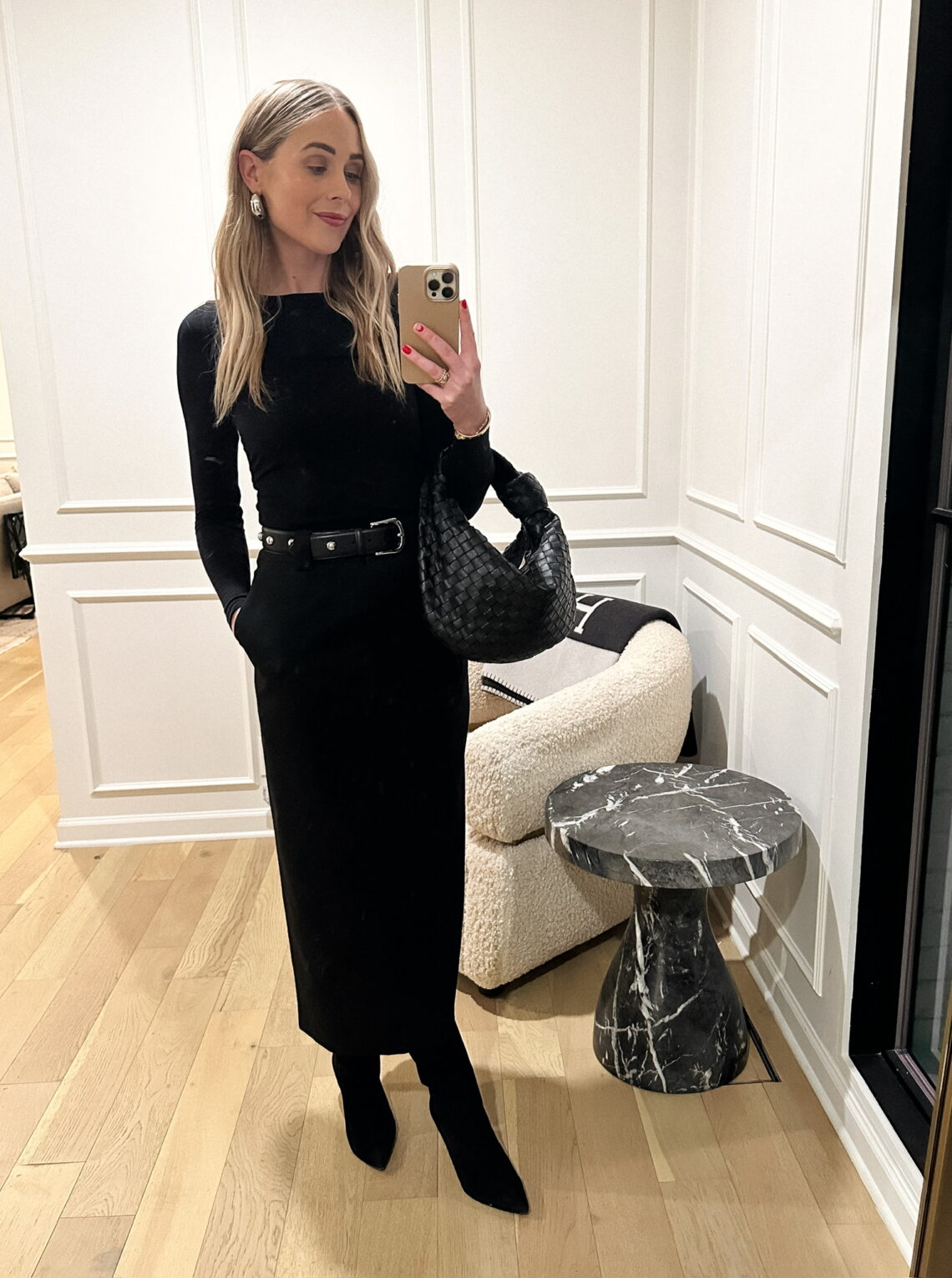 Fashion Jackson wearing MAYSON the label black skirt, black bodysuit, Bottega Veneta Jodie bag, winter evening outfit, winter date night outfit