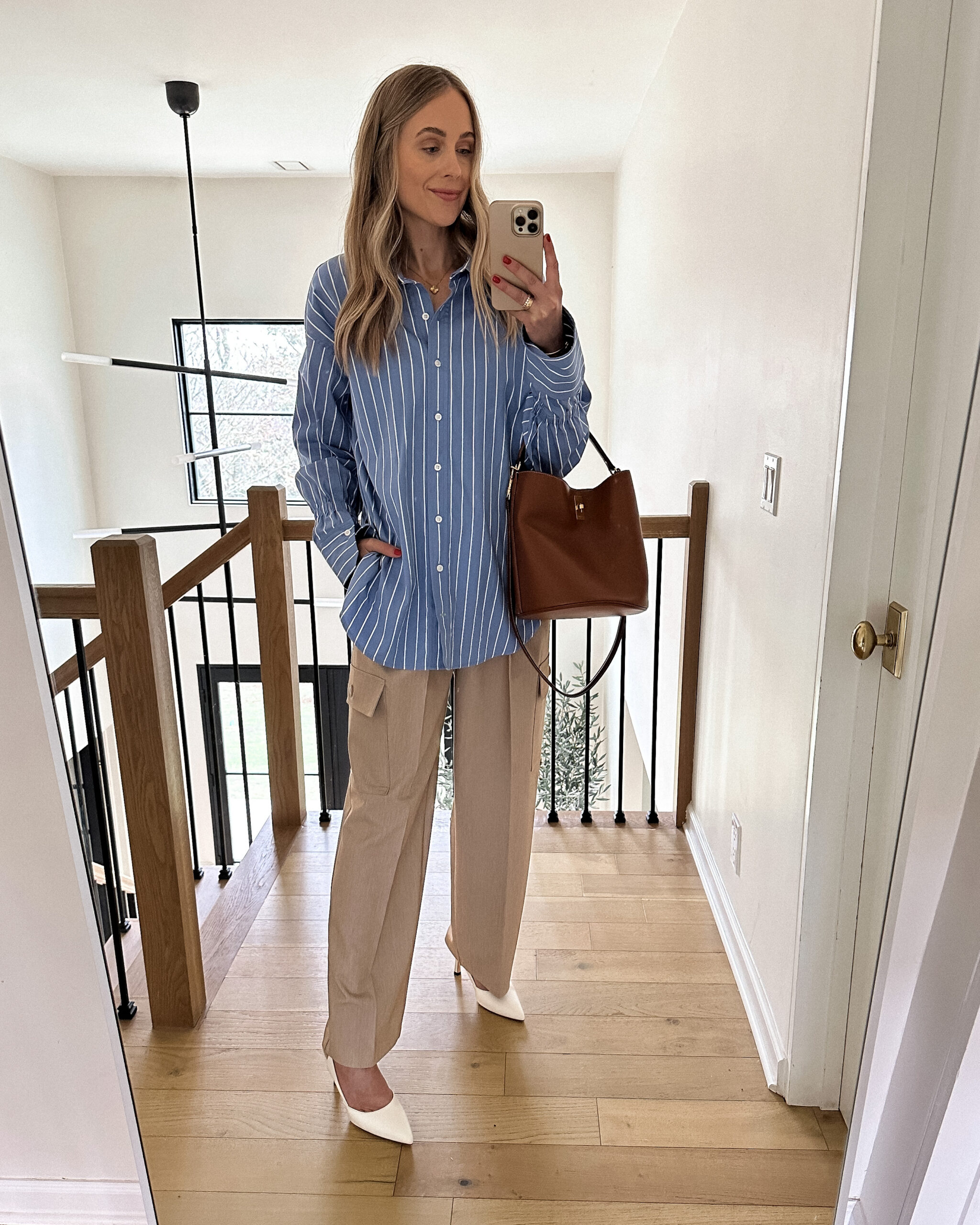 Fashion Jackson Wearing ALC Monica Blue Stripe Button Up Shirt Frankie Shop Maesa Cargo Trousers White Slingback Pumps Celine Triomphe Bucket Bag Spring Capsule Wardrobe