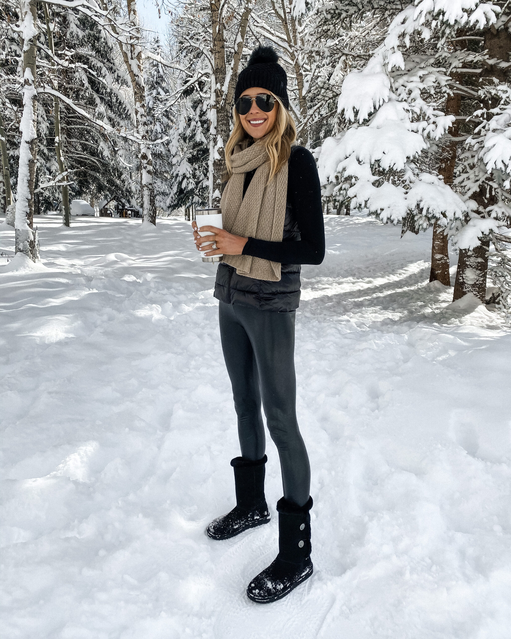 Fashion Jackson Wearing Commando Faux Leather Leggings Winter Outfit Black Puffer Vest Camel Scarf Black Beanie Black Snow Boots