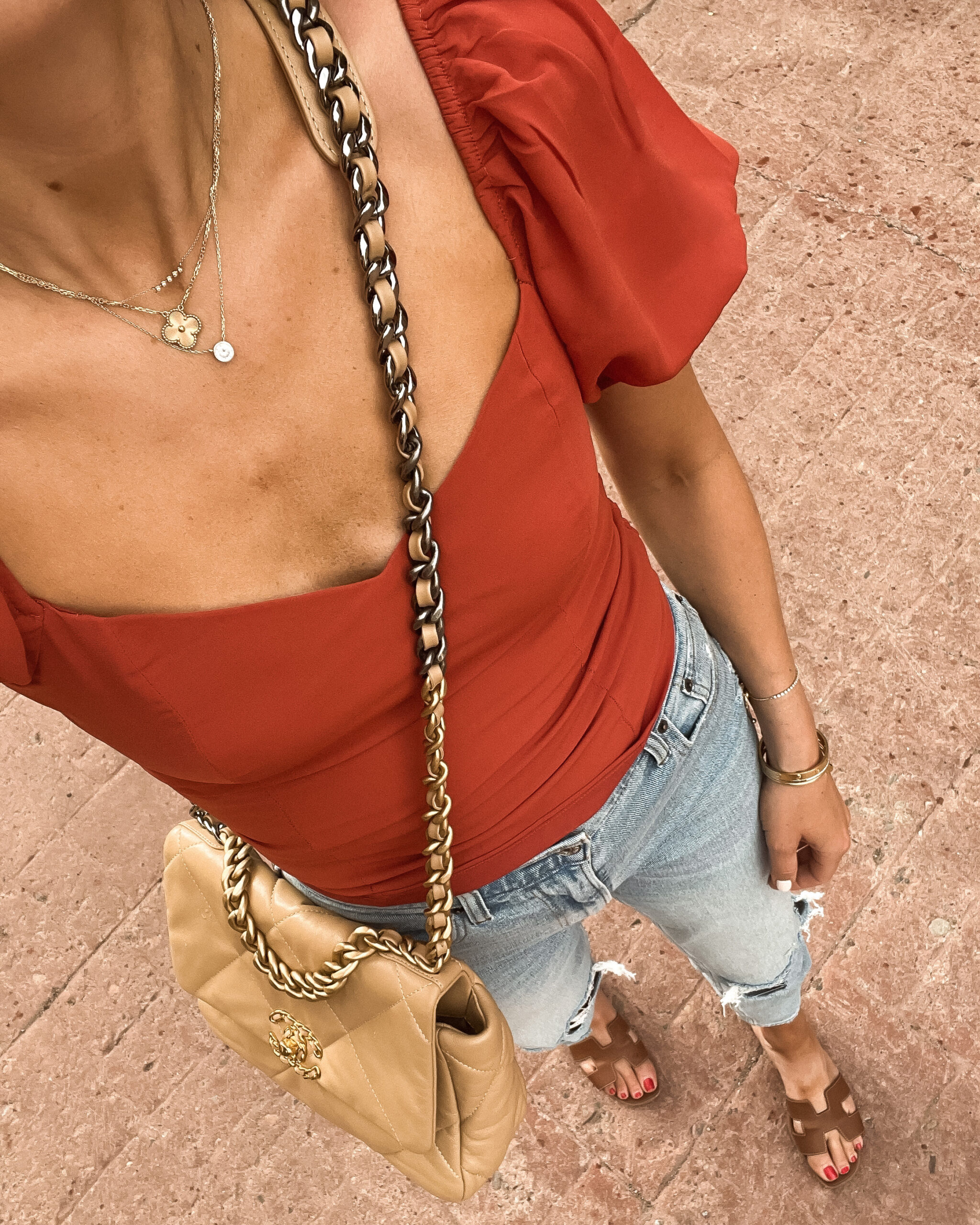 Fashion Jackson Wearing Aberceombie Red Puff Sleeve Top Abercombie Ripped Jeans Hermes Oran Tan Sandals Chanel 19 Beige Handbag