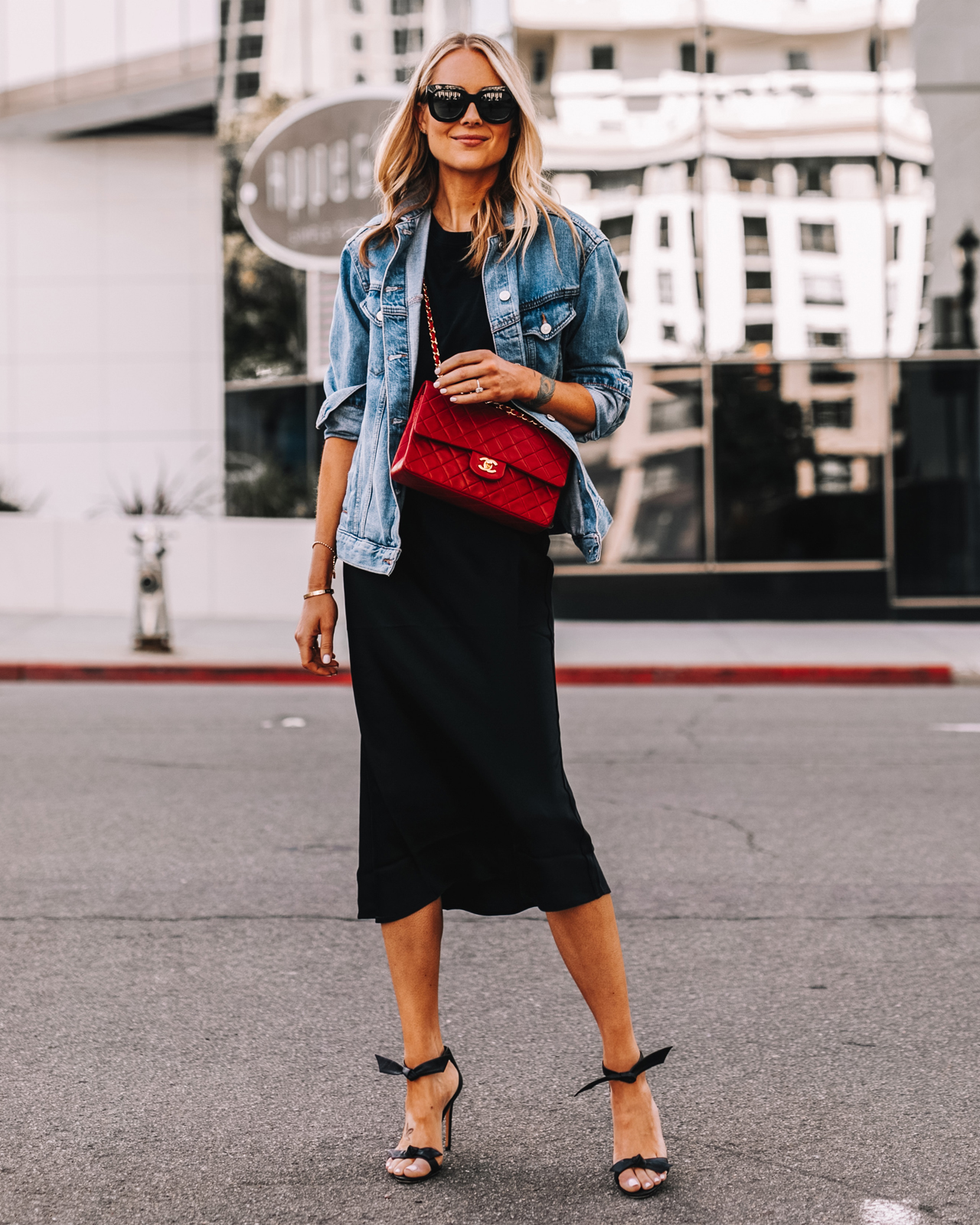 Fashion Jackson Wearing Anine Bing Black Slip Skirt Denim Jacket Red Chanel Handbag Black Heeled Sandals