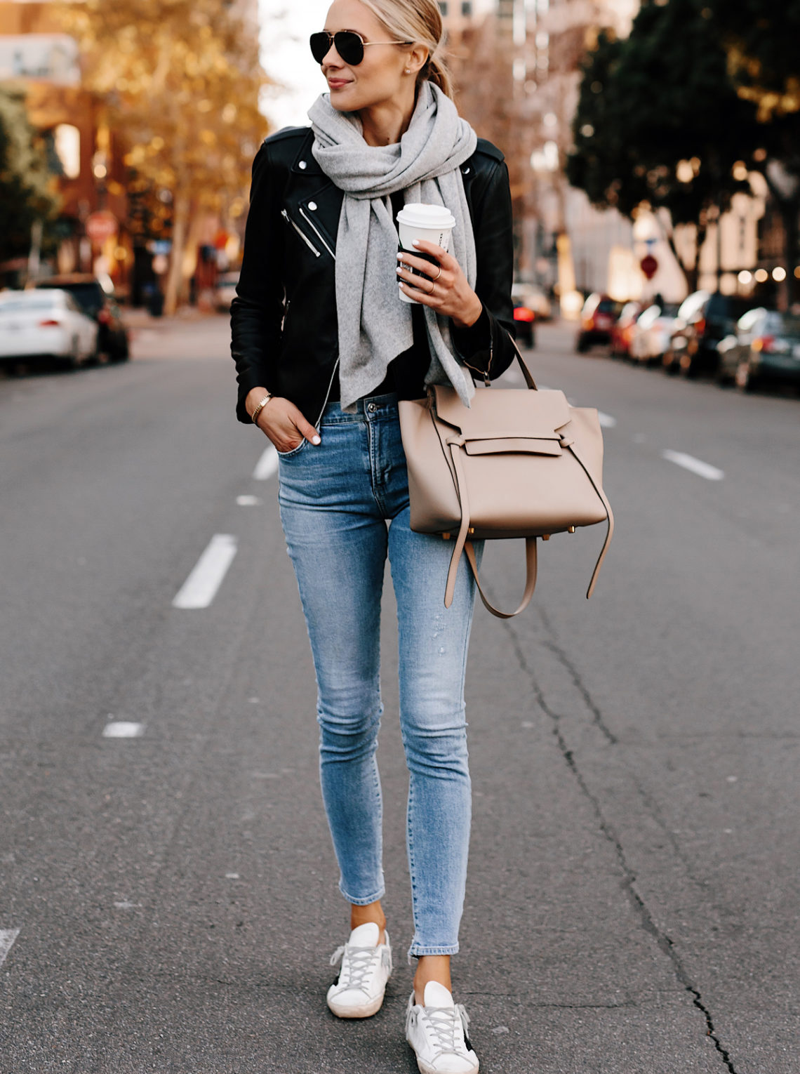 Blonde Woman Wearing Club Monaco Black Leather Jacket Grey Scarf Denim Skinny Jeans Golden Goose Sneakers Celine Mini Belt Bag Fashion Jackson San Diego Fashion Blogger Street Style