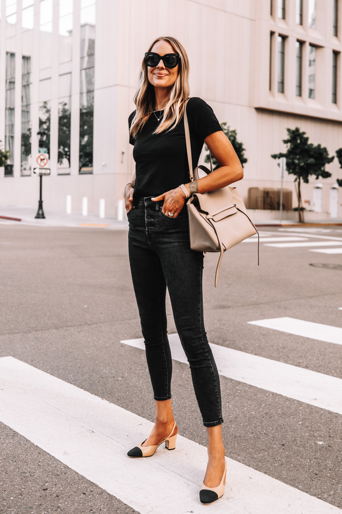 Fashion Jackson Wearing Everlane Black Short Sleeve Sweater Everlane Black Skinny Jeans Chanel Slingbacks Celine Belt Bag