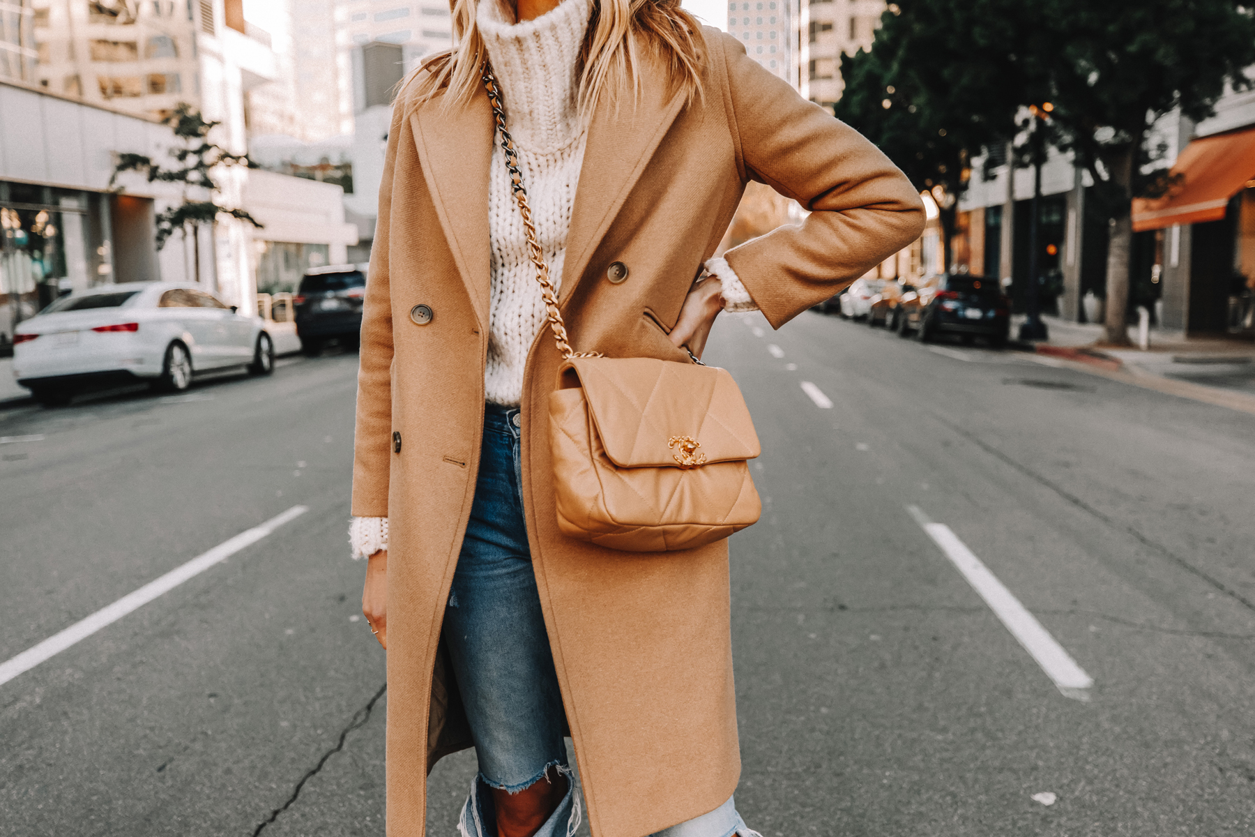 Fashion Jackson Wearing Everlane Camel Coat White Chunky Sweater Ripped Jeans Chanel 19 Small Beige Handbag