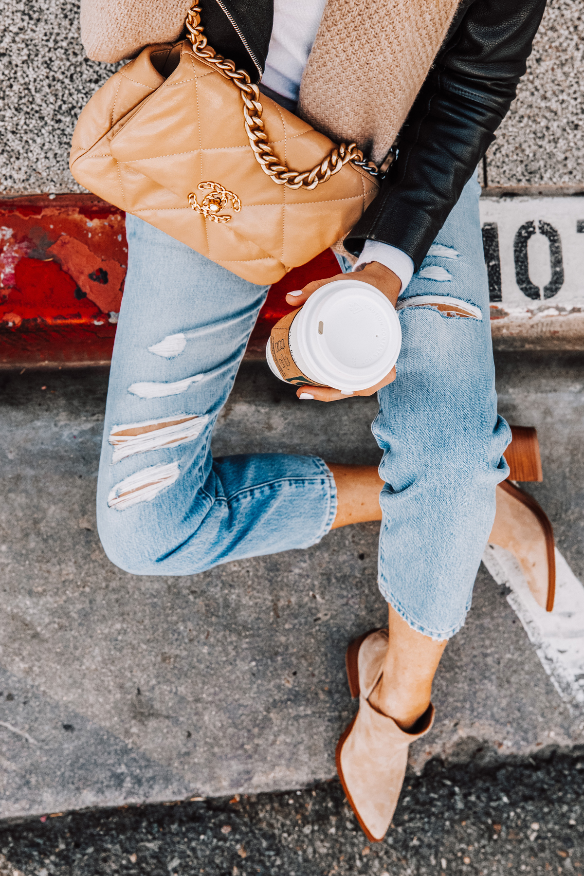 Fashion Jackson Wearing Ripped Jeans Tan Suede Booties Black Leather Jacket Tan Scarf Chanel 19 Dark Beige Handbag