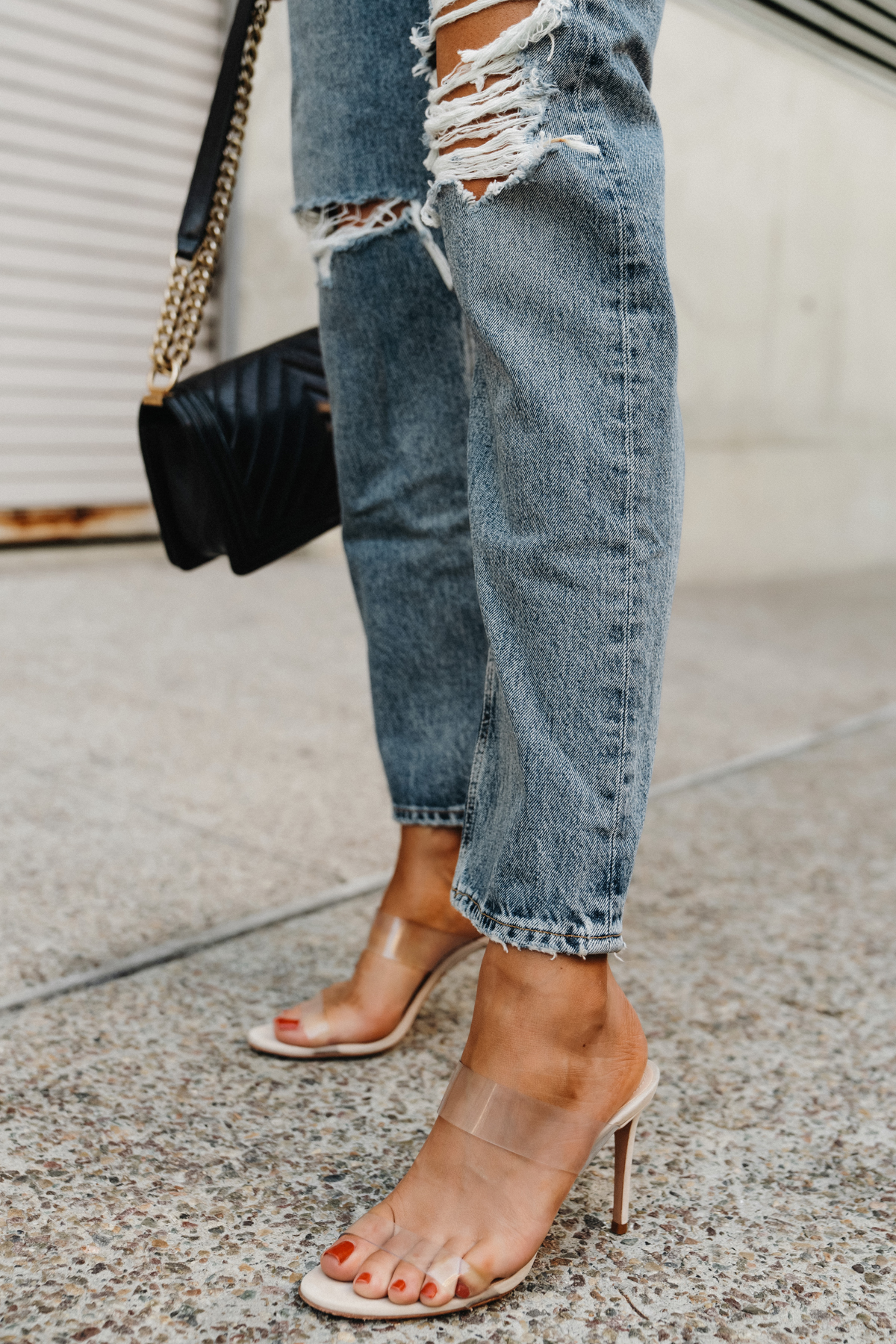 Fashion Jackson Wearing Schutz Ariella Sandals AGOLDE Ripped Jeans