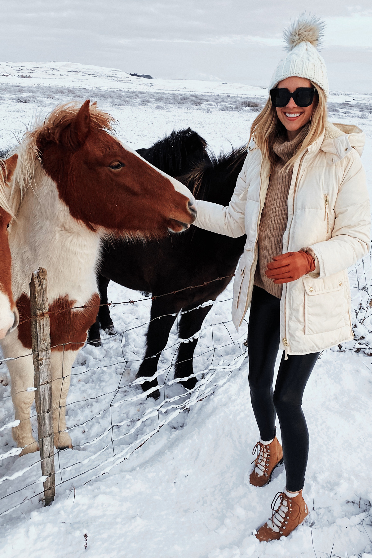 Fashion Jackson Wearing White Puffer Coat Winter Boots Iceland Horses Iceland Travel Guide