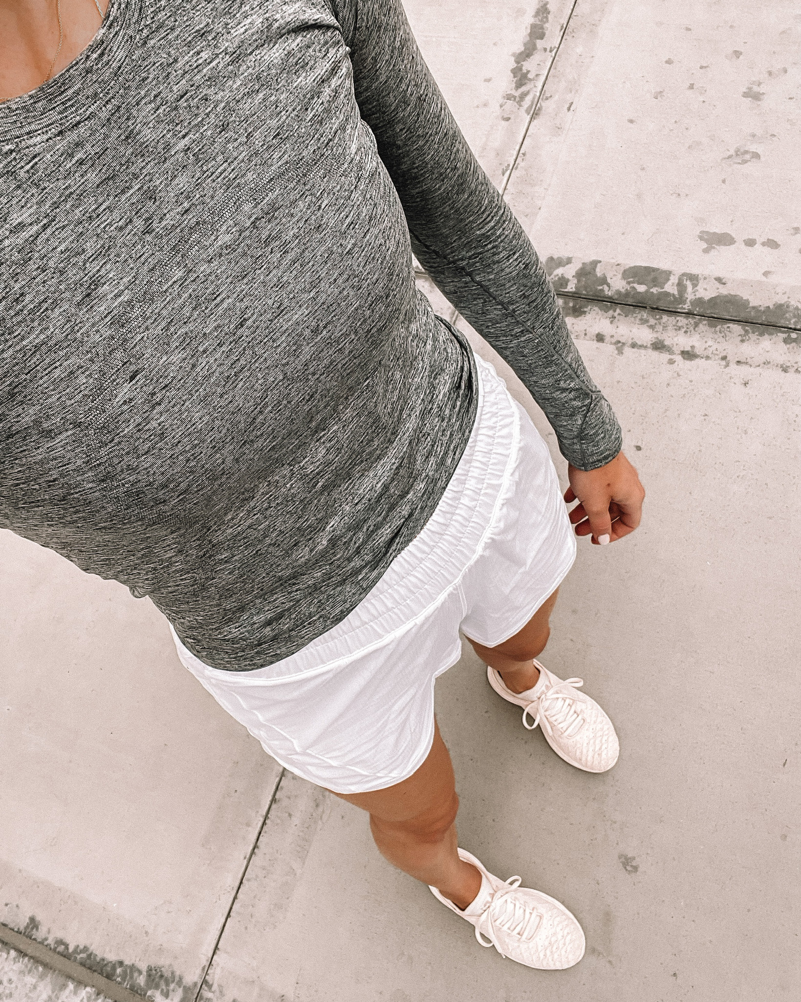 Fashion Jackson Wearing lululemon Swiftly Long Sleeve Top Grey lululelmon White Running Shorts APL Sneakers workout outfits for women