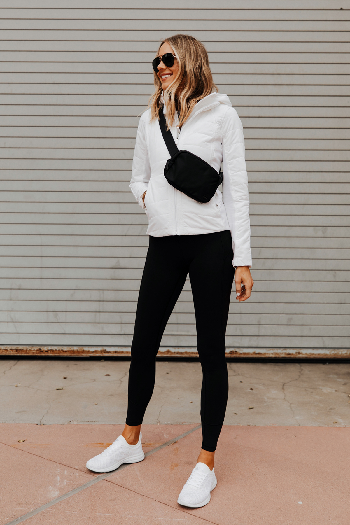 Fashion Jackson Wearing lululemon white zip up jacket, lululemon another mile jacket review, Black Leggings White APL Sneakers