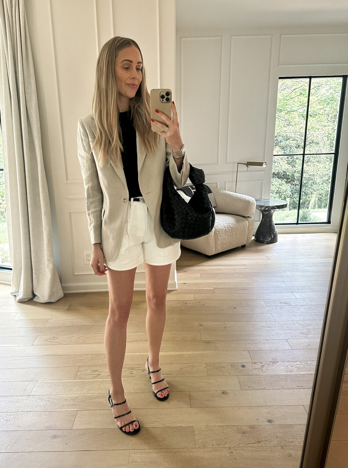 Fashion Jackson wearing Reiss Linen Blazer, Toteme Black Belt, Veronica Beard White Pleated Shorts, Summer Outfit