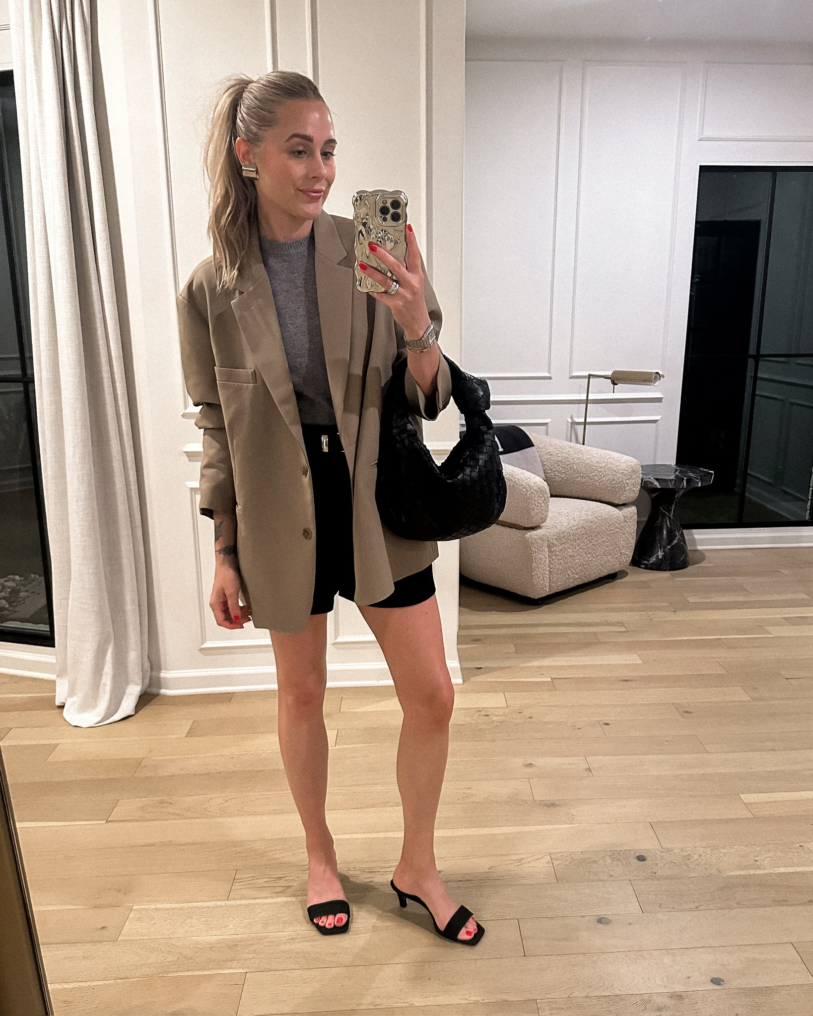 Fashion Jackson wearing Frankie Shop Bea Blazer, MAYSON the label trouser shorts, Bottega Veneta Jodie Bag