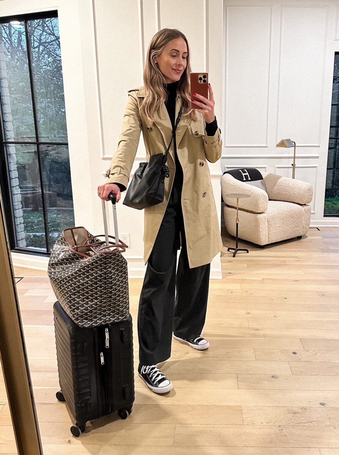 Fashion Jackson Wearing Mango Trench Coat Black Commando Bodysuit Grey Wide Leg Trousers Converse Sneakers Amazon Luggage Goyard Tote Loewe Flamenco Black Handbag Travel Outfit