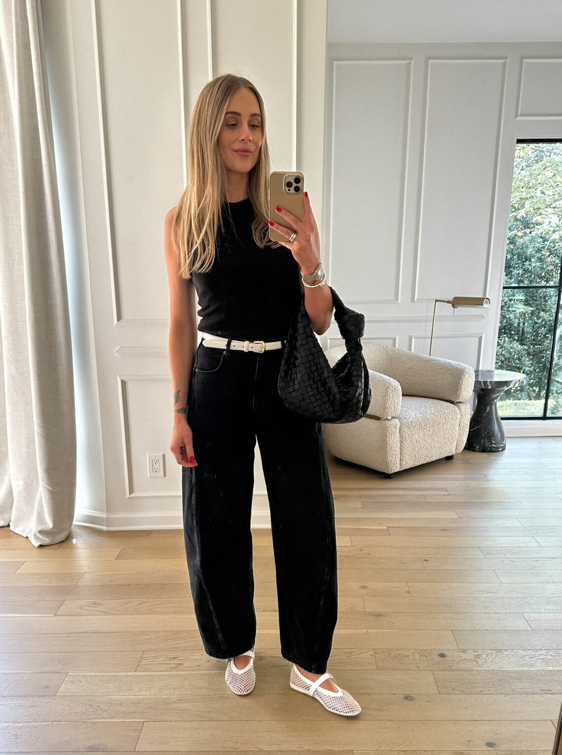 Fashion Jackson Wearing Black Tank Tibi Black Barrel Leg Jeans White Belt White Fishnet Mesh Flats Black Bottega Teen Jodie Handbag Summer Outfit