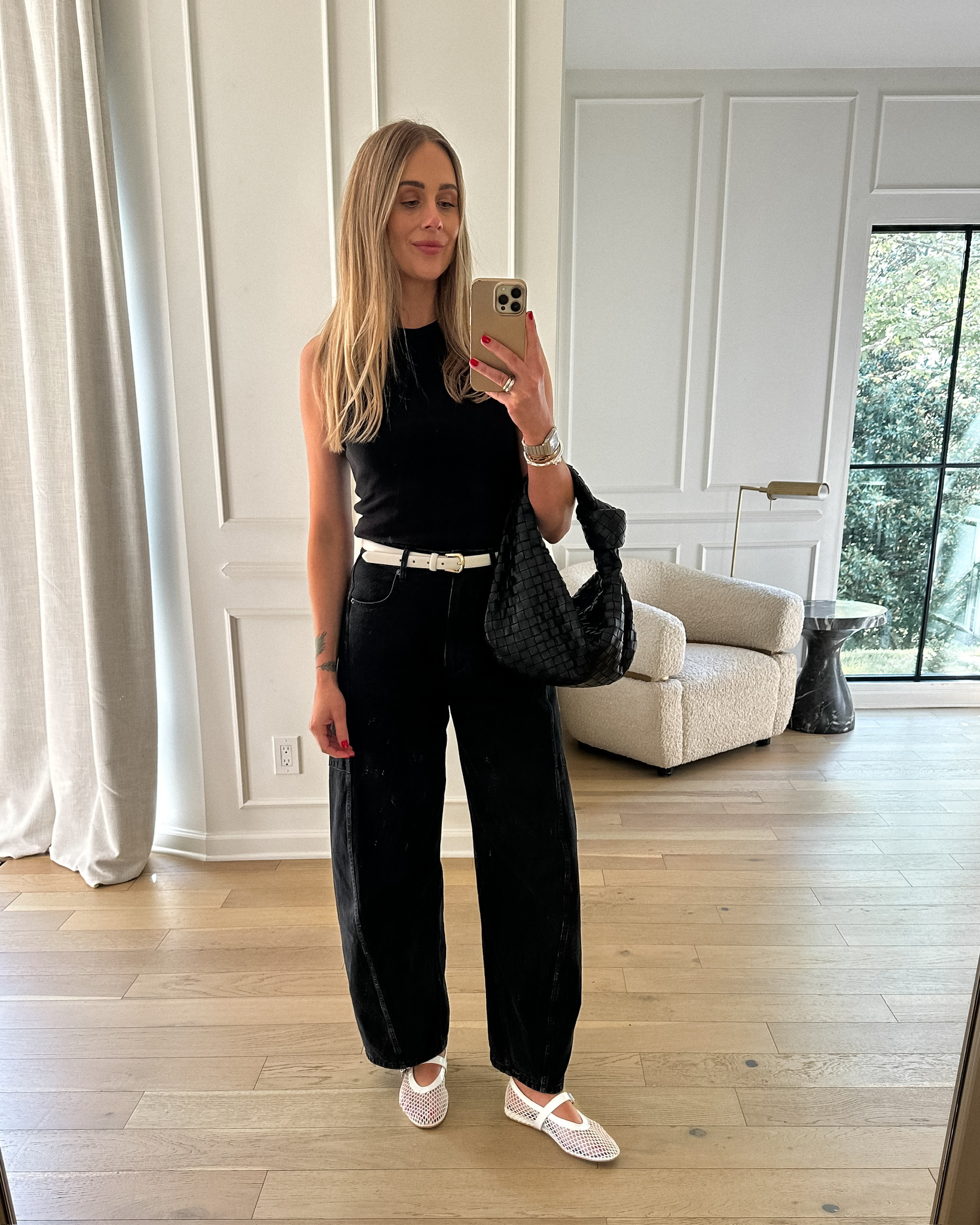 Fashion Jackson Wearing Black Tank Tibi Black Barrel Leg Jeans White Belt White Fishnet Mesh Flats Black Bottega Teen Jodie Handbag Summer Outfit