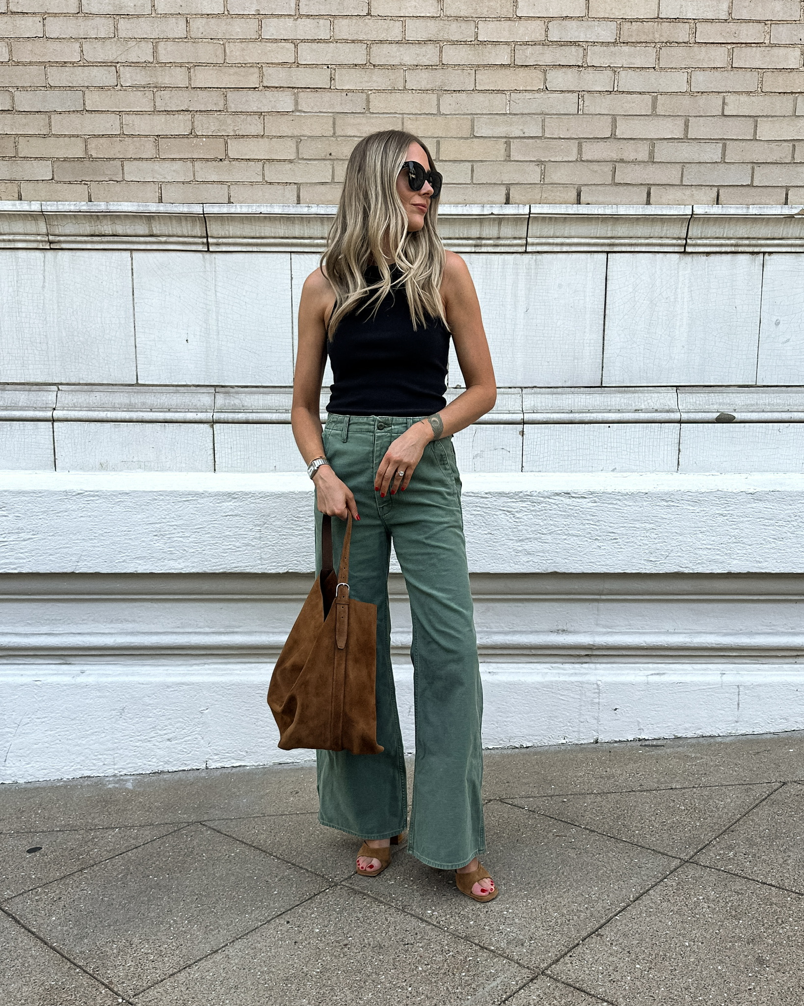 Fashion Jackson Wearing Black Tank Mother Denim Green Pants Toteme Brown Suede Handbag Stuad Brown Suede Platform Sandals Summer Outfit