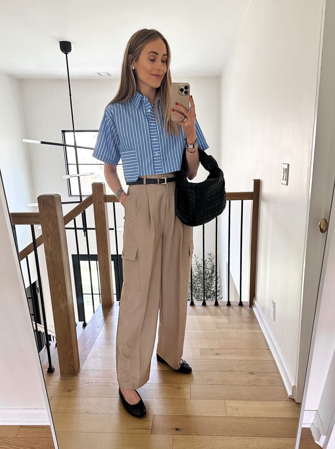 Fashion Jackson wearing spring capsule wardrobe cargo trousers black ballet flats cropped striped shirt bottega veneta handbag