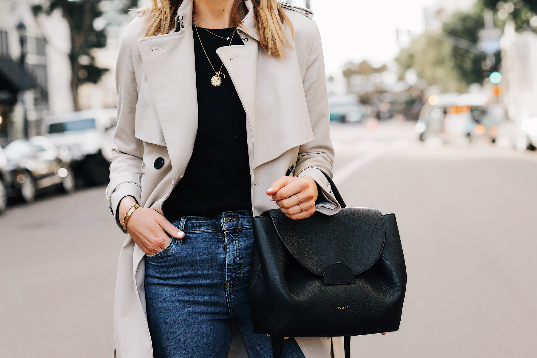 Blonde Woman Wearing Trench Coat Black Sweater Denim Skinny Jeans Polene Number One Handbag Monochrome Black Fashion Jackson San Diego Fashion Blogger Street Style