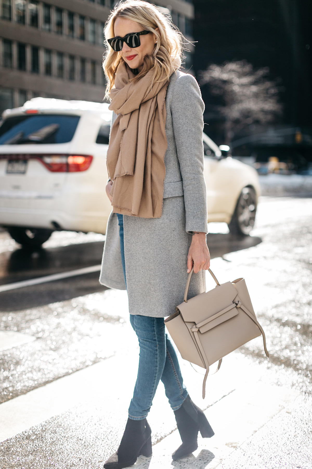 NYFW Fall/Winter 2017, Street Style, Grey Coat, Tan Blanket Scarf, Denim Skinny Jeans, Celine Tie Handbag, Black Ankle Booties