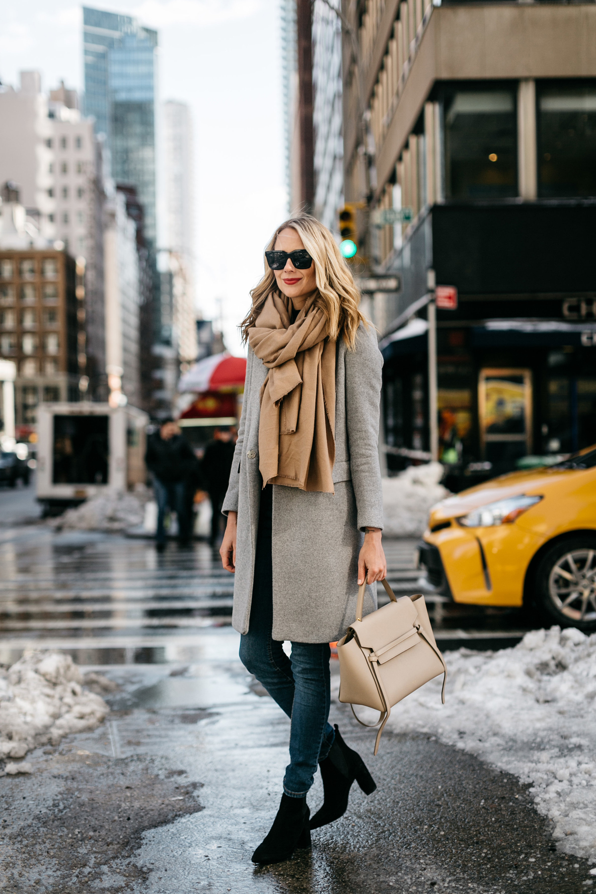 NYFW Fall/Winter 2017, Street Style, Grey Coat, Tan Blanket Scarf, Denim Skinny Jeans, Celine Tie Handbag, Black Ankle Booties